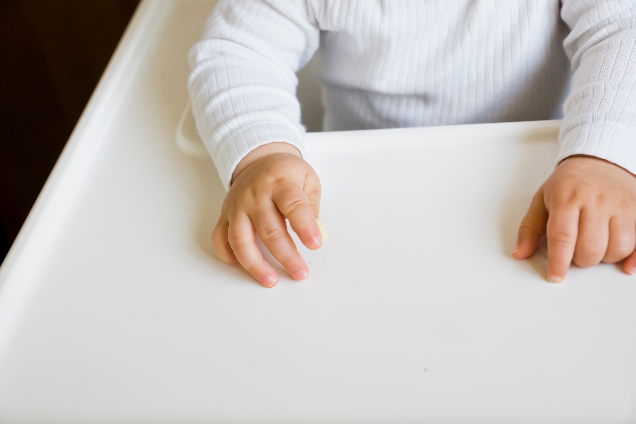 Baby Eating in High Chair